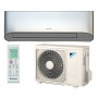 Инверторный кондиционер серебристого цвета Daikin FTXK25AS/RXK25A